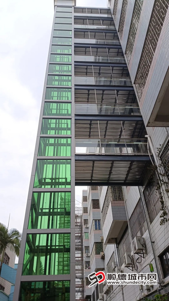 加裝電梯后的樂從社區(qū)新業(yè)樓。.jpg
